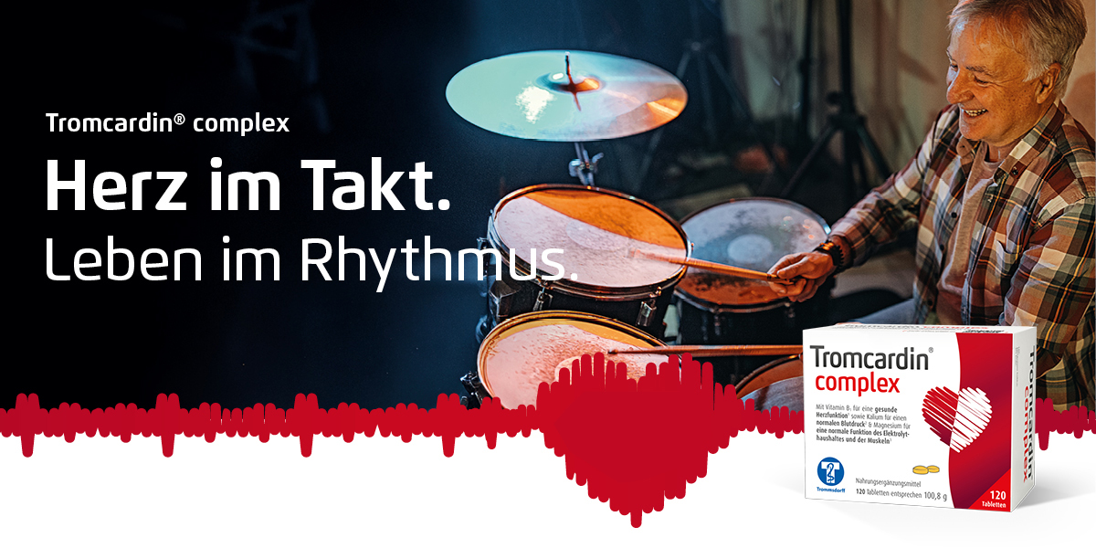 Rotes Herz mit weißer Linie und Kreisen mit K+ und Mg++. Hintergrund weiß.